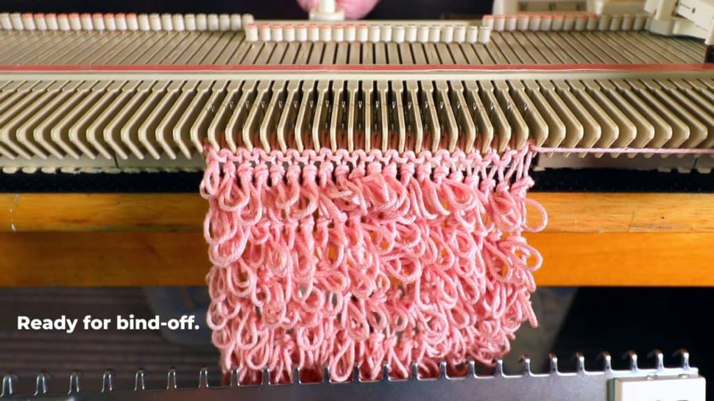 Machine knitting a loop stitch for big texture 